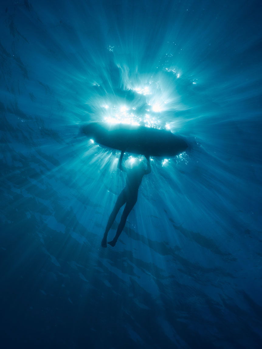View of a boat on the surface of the ocean from the bottom