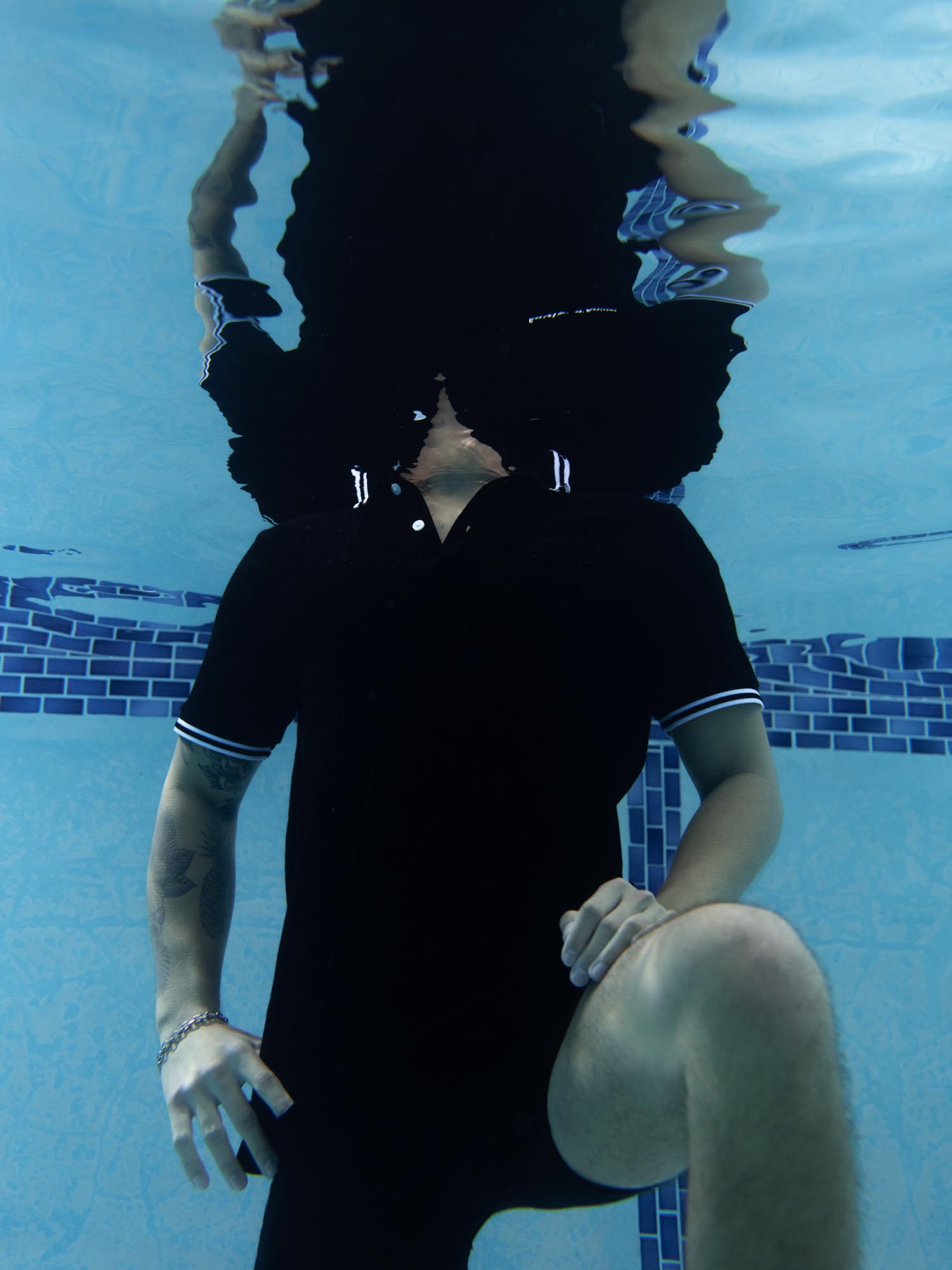 An abstract amalgamation of reflections forms the basis of this strange underwater portrait