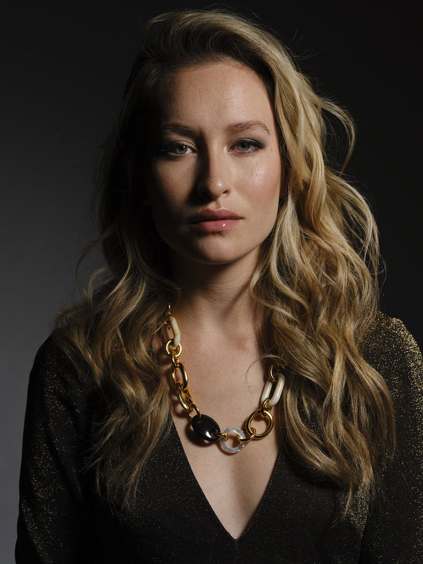 Portrait headshot of a woman with blonde hair
