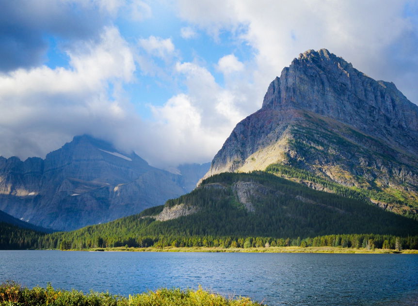 Rugged mountain beyond placid lake