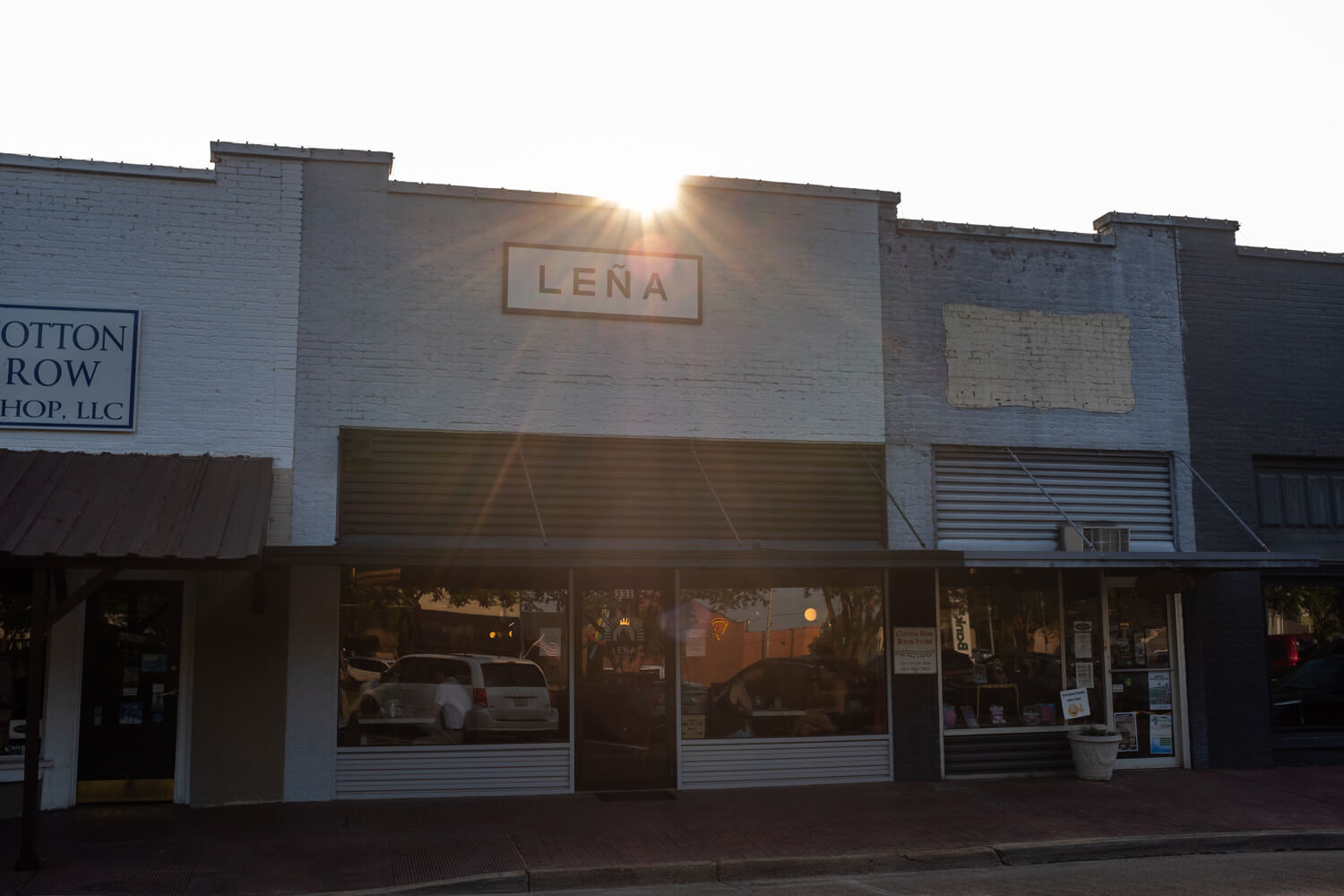 Sun rises over the roof of Lena restaurant
